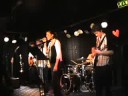 serviette union w/solveig r�mkes performing their only song with vocals ever(!) live. enjoy!

(oh, man...i've always wanted to do this!)
here are the lyrics:

verse 1:
every time i look at you
you make my heart go cho-cho-cho
like a train on its track.
baby, why won't you take me back?

chorus:
sweet love by the fire
baby please take me higher
sweet love by the fireplace
let me kiss you in the face!

verse 2:
when i'm down and feeling blue,
darling, i blame it all on you.
you took my heart, and i just can't see
why you couldn't take the rest of me!