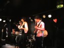 serviette union w/solveig r�mkes performing their only song with vocals ever(!) live. enjoy!

(oh, man...i've always wanted to do this!)
here are the lyrics:

verse 1:
every time i look at you
you make my heart go cho-cho-cho
like a train on its track.
baby, why won't you take me back?

chorus:
sweet love by the fire
baby please take me higher
sweet love by the fireplace
let me kiss you in the face!

verse 2:
when i'm down and feeling blue,
darling, i blame it all on you.
you took my heart, and i just can't see
why you couldn't take the rest of me!