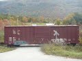 vermont railway train bnr extra, the daily train from rutland to north bennington, makes some good noise as it comes to a country road crossing just south of danby station, in danby, vermont.  today's consist is gp40 301 with a 13 car mixed freight.  enjoy the sound of the nathan p5 horn on the 301.  if you have any questions about the video, feel free to message me.  comments are welcome.  the video was taken on october 6th, 2008.