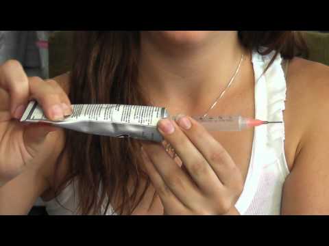 how to remove rhinestone glue from fabric