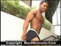 Bodybuilder Jonathan Irizraary poses outdoors