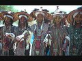 this song is in fulfulde bororo (bororo fulani) or wodaabe.  woda in fulfulde means taboo.  this song is known as gaynaako or the herdsman in bororo fulani.