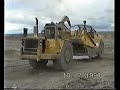 Cat 657B scrapers and D9 pusher