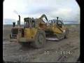 Cat 657B scrapers and D9 pusher