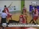Basketball-Player punches hard the refferee
