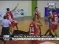Basketball-Player punches hard the refferee