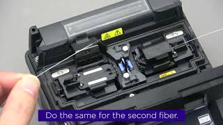 Inserting the fibers into the splicer