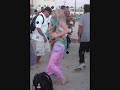 Dancing Girl In Venice Beach, California by ATTILA CSUPO
