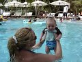 Andrew swimming with Mommy