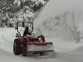 snowblowing kubota tractor