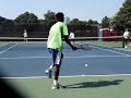 practicing serves on the practice courts during legg mason 2007.  serve motion looks very similar to roddick's serve (look at video response to see a clip of roddick practicing serves two practice courts away).