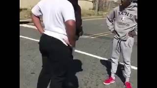 OG stops fight with two teens and calls people recording with their phones COWARDS