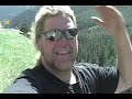 lion king hikes into the rockies with josh and meets an at hiker on the road.