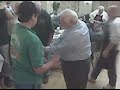 Tommy Lasorda teaches a youngster