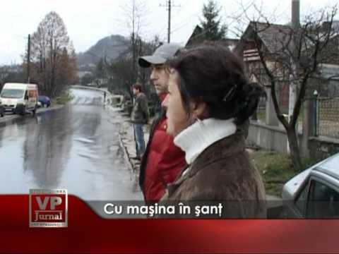 Cu maşina în şanţ