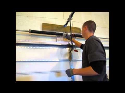 how to torsion spring garage door