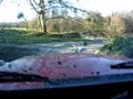 Mercedes Benz Gel�ndewagen G-wagen offroad on muddy track