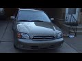 this is my car; a 02 subie lgt limited. it is a 5spd 2.5l na. its beige outside with black leather on the inside. right now it has 80k miles and is dead stock.