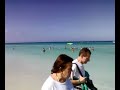 Sexy girls dance in the Caribbean sea