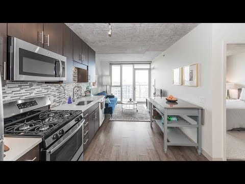 A sunset view 1-bedroom model at the boutique Gateway West Loop A sunset view 1-bedroom model at the boutique Gateway West Loop