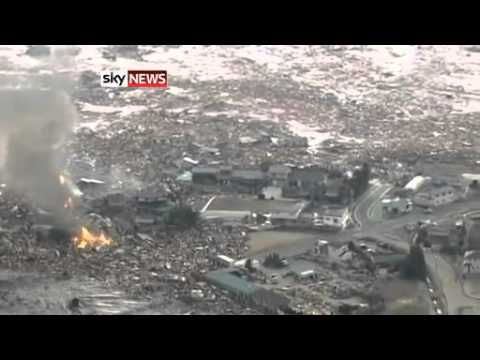 japan 2011 ufo - Starting at 0:58 sec, a UFO flying over field, coming in from left. Original video from SkyNews.