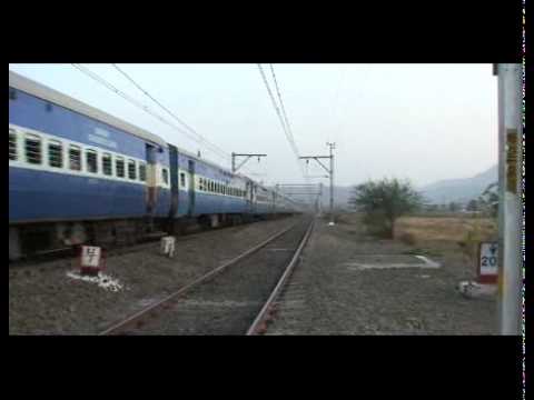 17558 - The MLY WDM2# 17558 starts accelerating quickly with the tiny load of Dadar Hyderabad Special at the sharp curve after Shelu station. Time was 18:30Hrs. Vide...