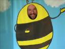 Friendly folks become friendly giant bees when they step behind this carnival-style painting of a Giant Bee to have their picture made.The Giant Bee is none other than JERRY BEE star of the new Candlewick picture book 