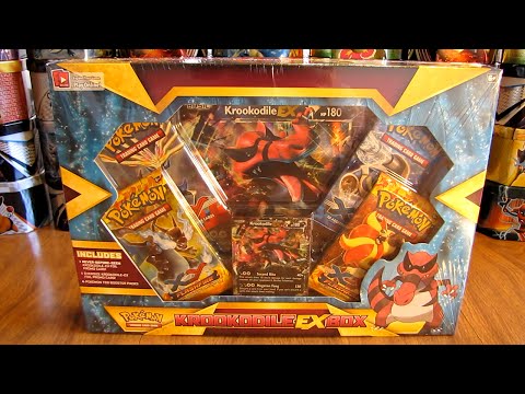 box - A Krookodile EX Box is opened in this video. This box includes a Krookodile EX foil promo card, an oversized Krookodile EX card, an online TCG code card and 4 Pokemon booster packs, 2 each...