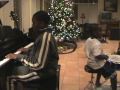 Eric Tim French plays Jingle Bells with his cousins, James and Jaxon