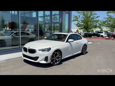 Certified Used 2025 Mineral White Metallic BMW 230i xDrive image 1