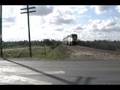 Amtrak San Joaquin flies past the town of Ballico, CA