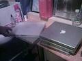 a pile of laptops: mac vs pc