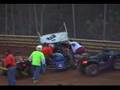 Dave Grube goes head on into turns 1 and 2 and flips