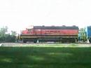 BNSF AND EMD LOCOS IN ROCHELLE ILLINOIS WITH SWOOSH SCHEME!