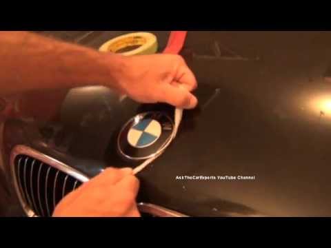 how to remove bmw trunk emblem