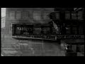 brief clip of marilyn monroe's funeral. eulogy given by lee strasberg. narrated by john huston.