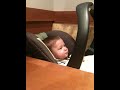 Cameryn eating his puffs
