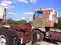 Farmall 400 pulling Crackerbox