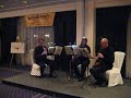 performance by a trio from the pittsburgh symphony orchestra during the allegheny conference european tour. this was their stop in amsterdam, the okura hotel