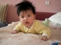 Matvey flipping to his stomach (4 1/2 months old)