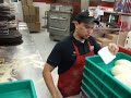 This is a guy at papa johns throwing dough, although it isnt anything fancy he is just showing the basics, and if you can master this you can go onto many other more complicated tircks. This was regular Large dough.