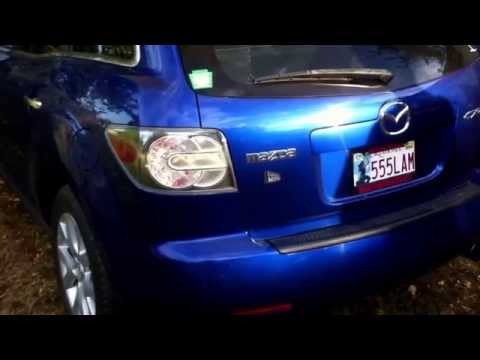 Mazda Cx-7 How to replace tail brake light reverse turn signal light bulb