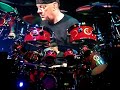 Neil Peart Drum Solo - RUSH Snakes and Arrows Tour -  DEAD CENTER FRONT ROW at Hollywood Bowl, July 23, 2007. RUSH ROCKIN' HARD!! Neil played four little mini-sets during his solo. This is Part 1 of 2 so be sure to check out the other one. The melodic song he plays was from a tear-out freebie LP from a magazine back in the 80's -- anyone remember those?? Flimsy little paper like things that were specially inserted into the publication. This is a MPEG shot with Sony Cyber-shot 7.2mega pixel camera. Pretty impressive for such a tiny little device. If you listen, the drum sounds that the mic picked up were actually vibrations off the drum set as Neil hit them - with a little filler from the amps. Our seats were dead center - right in front. Which is about 10 feet from the front of the stage and about 18-20 from where the drum kit(s) were set up.