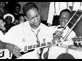 here is another charlie christian track playing live at mintons in new york city (the other i have uploaded is swing to bop from the same session). these are my two favourite cc tracks.  however i also love his goodman stuff, both studio and radio broadcasts as well.  charlie not only popularised the electric guitar, but also influenced just about everyone who came after with his horn like solos and sense of swing. 

as well as playing guitar for benny goodman, charlie did some moonlighting in after hours jam sessions with other musicians in places such as mintons and monroes in new york city.  on 12 may 1941 charlie christian jammed on 'stompin' at the savoy' at mintons, with joe guy on trumpet, kenny kersey on piano, nick fenton on bass and kenny clarke on drums. thelonius monk has always been attributed as the piano player on this session, although current opinion seems to be that it was kenny kersey based on analysis of the piano style. however monk did certainly play with charlie at these venues around this period. 

this live track excerpt is characterised by longer solos than charlie would typically play with goodman, and is a good indication of his incredible improvisational abilities. as there is no film available of charlie christian playing live, i have included a slide show for this track. 
 
comments welcome.