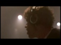 scene from the 1985 film the coca-cola kid, starring eric roberts and greta scacchi. this scene focuses on the recording of a coca-cola jingle with an 