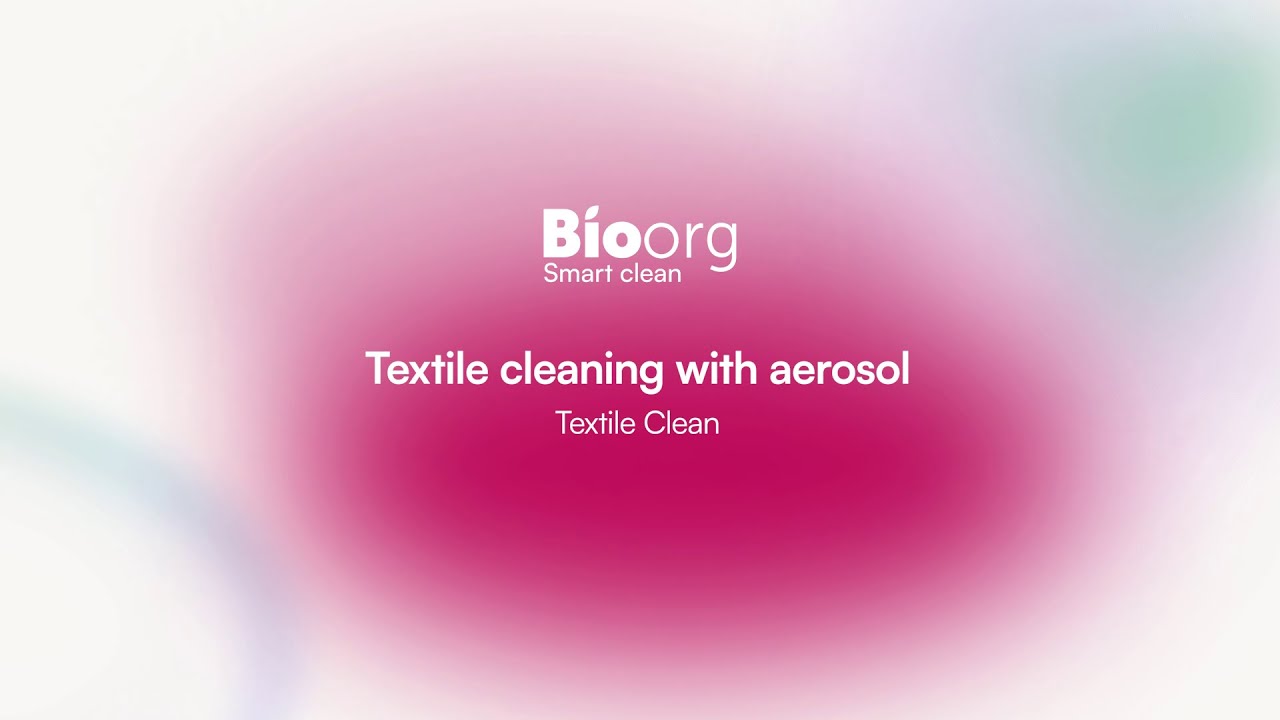 Textile cleaning with aerosol