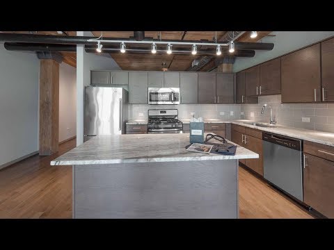 A waterfront 1-bedroom plus den at Streeterville’s Lofts at River East A waterfront 1-bedroom plus den at Streeterville’s Lofts at River East