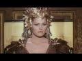 A beautifully made fantasy film about an immortal queen in the lost city of Kuma. At first she meets John Richardson in Palestine and invites him to travel to her city. The scene then changes to Kuma. Christopher Lee plays the High Priest. Produced by the famous Hammer Film studio of England, and followed by the sequel Vengeance Of She. First filmed as a silent movie, and then again in 1935, it's based on the novel by H.Rider Haggard. This is intended as a preview to encourage purchase and rental.
