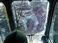 Transfering mud with the excavator