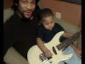 karim playing the guitar